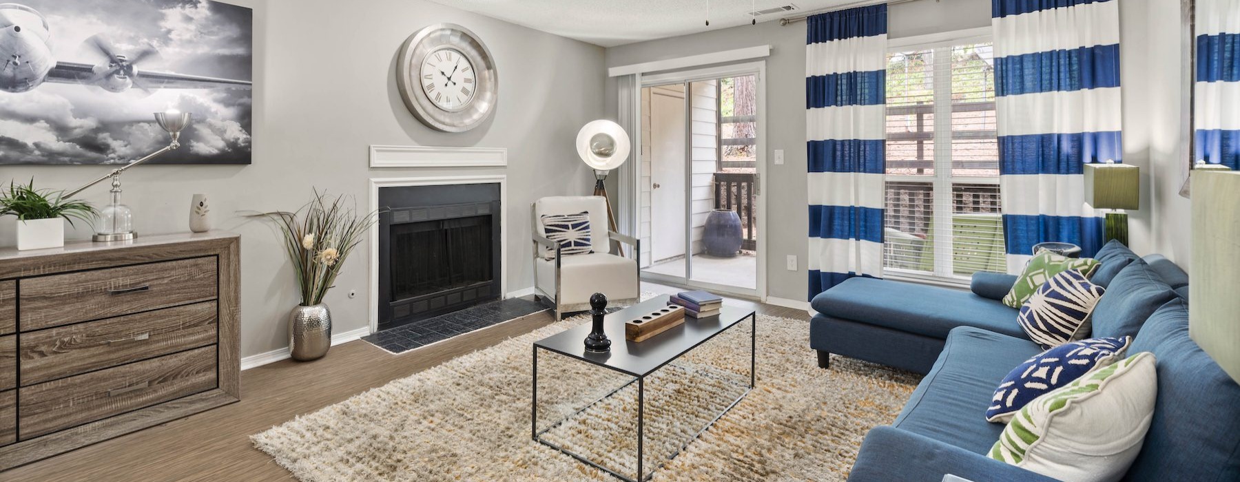 a living room with a fireplace