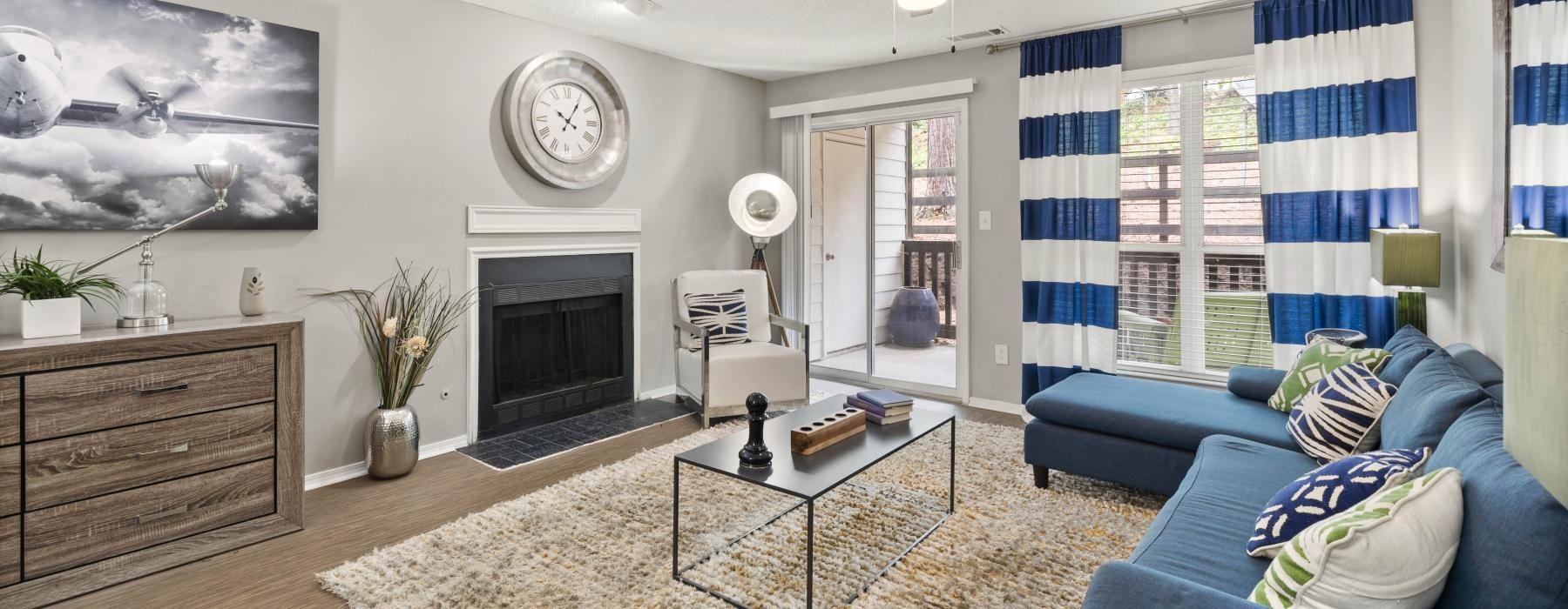 a living room with a fireplace